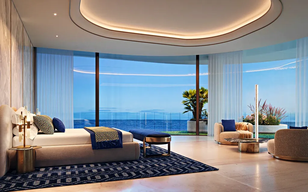 A bedroom at Jacob & Co. Beachfront Living