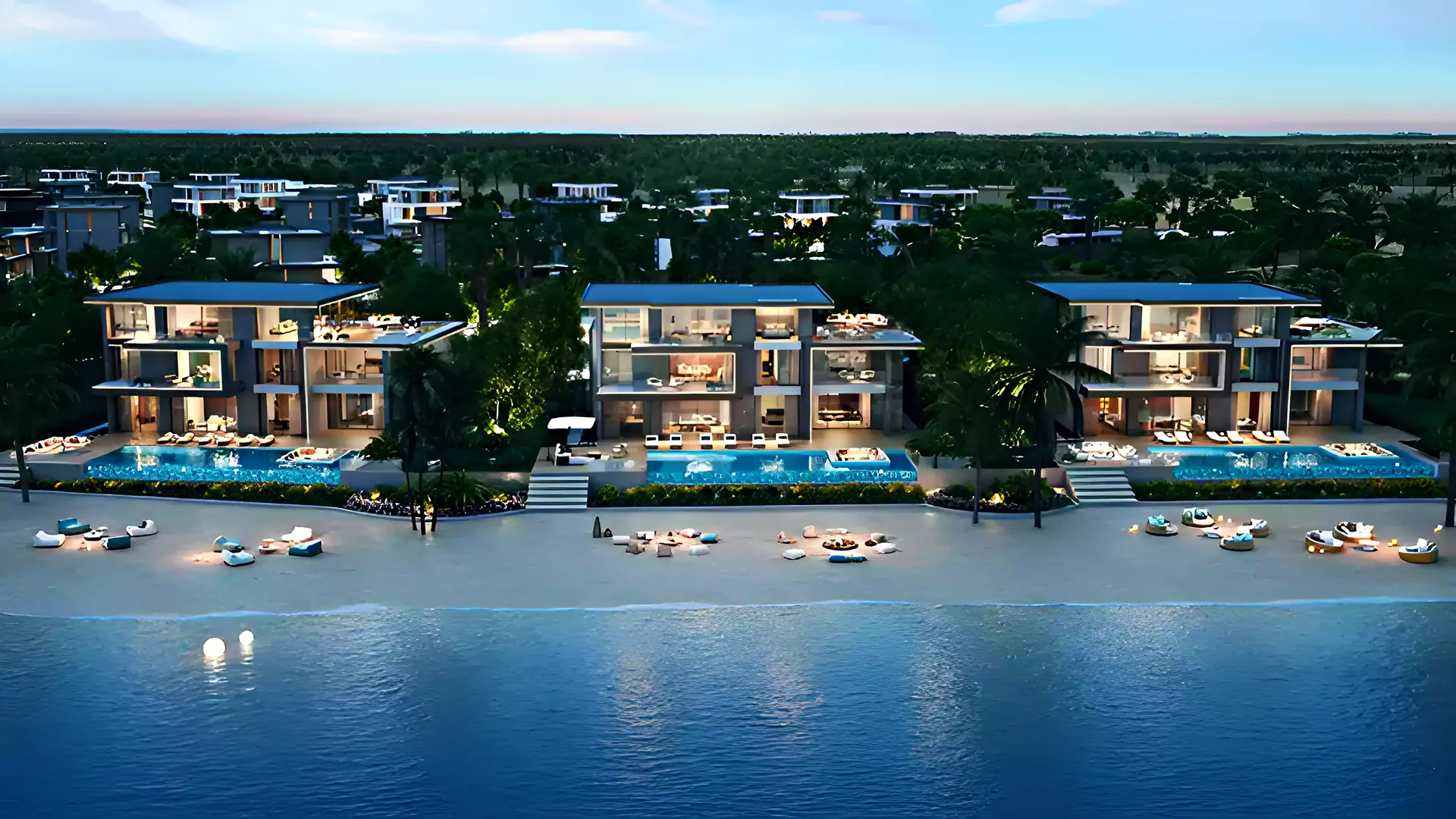 Beachfront mansions at Jacob & Co. Beachfront Living at dusk