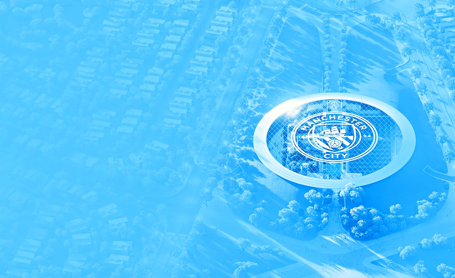 The Manchester City crest on the ground at the heart of the community, seen from the air